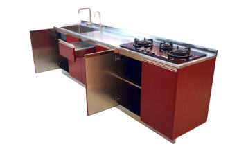 Elegantly designed kitchen cabinet with glass topped stove and sink attached to it.