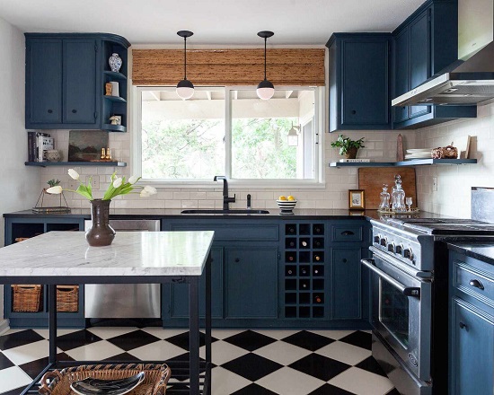 kitchen with a dark-colored theme, with storage spaces, lights, wash area and table